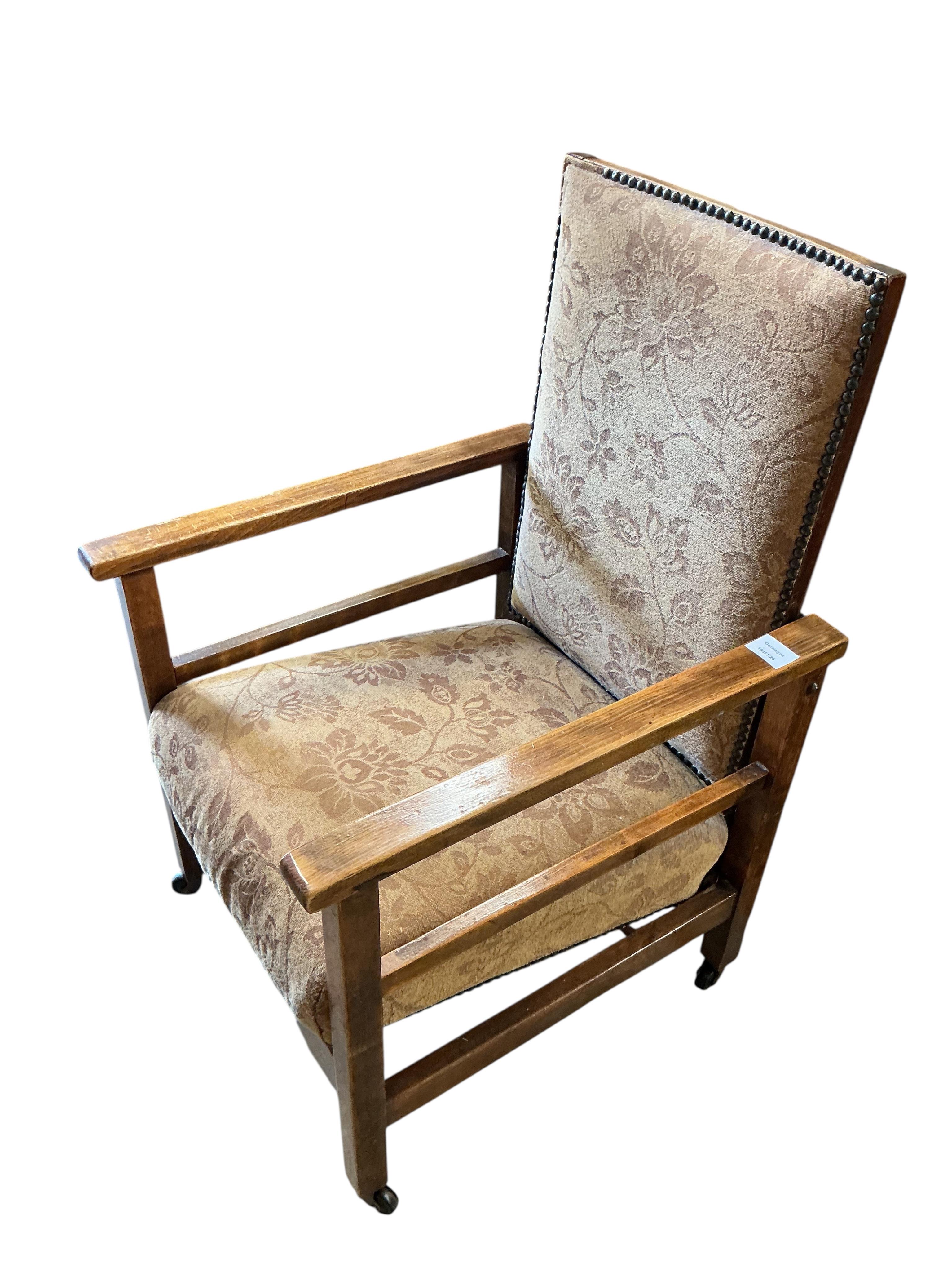 An early 20th century upholstered beech reclining armchair, width 54cm, depth 57cm, height 91cm